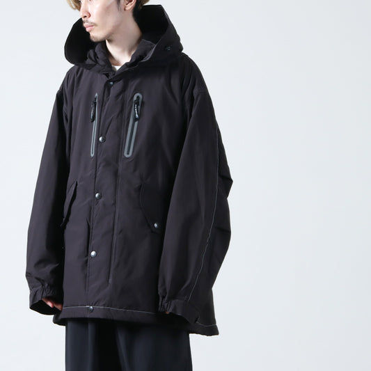and wander(アンドワンダー) fishtail Octa coat
